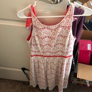 Lace and coral dress.